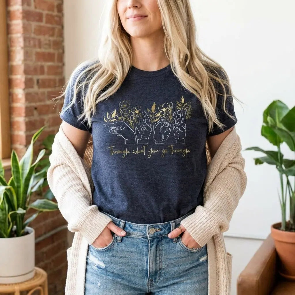 Winks Design Studio Grow Through What You Go Through T-shirt featuring motivational text on soft cotton fabric.