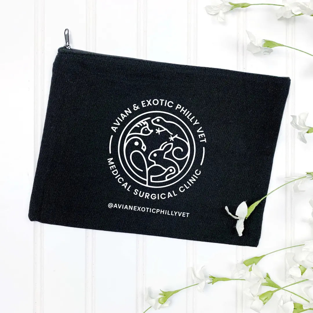 Winks Design Studio Exotic Wristlet Cosmetic Bag featuring vibrant avian bird patterns and compact design for travel and organization.