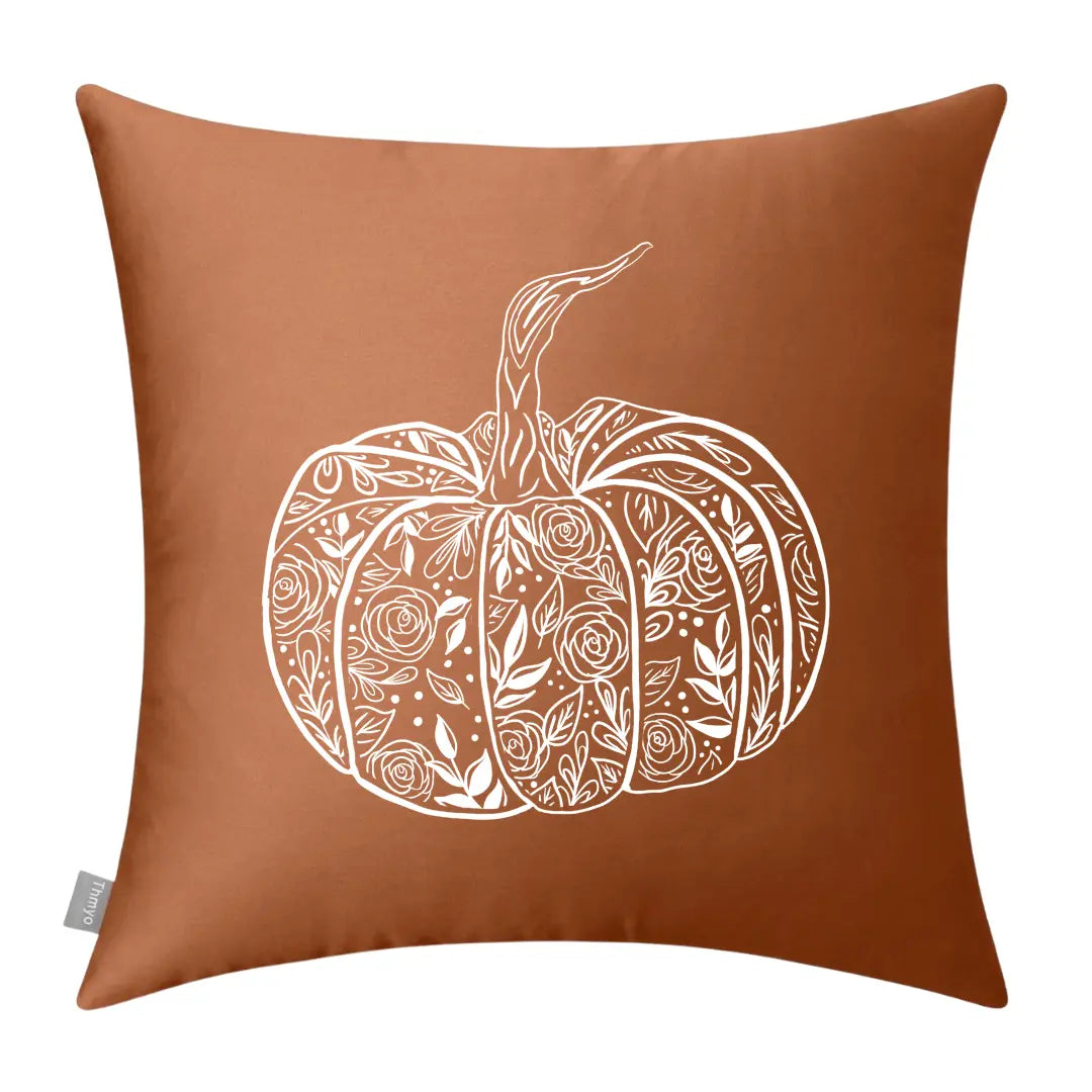 Flower pumpkin pillow by Winks Design Studio, LLC featuring a vibrant floral design on a soft decorative pillow.