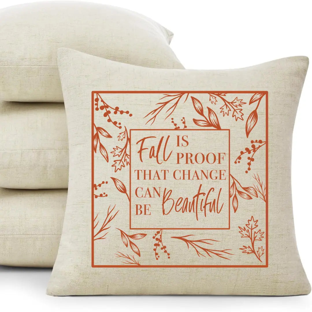 Winks Design Studio LLC fall-themed pillow with the phrase "Fall Is Proof That Change Can Be Beautiful" in warm autumn colors.