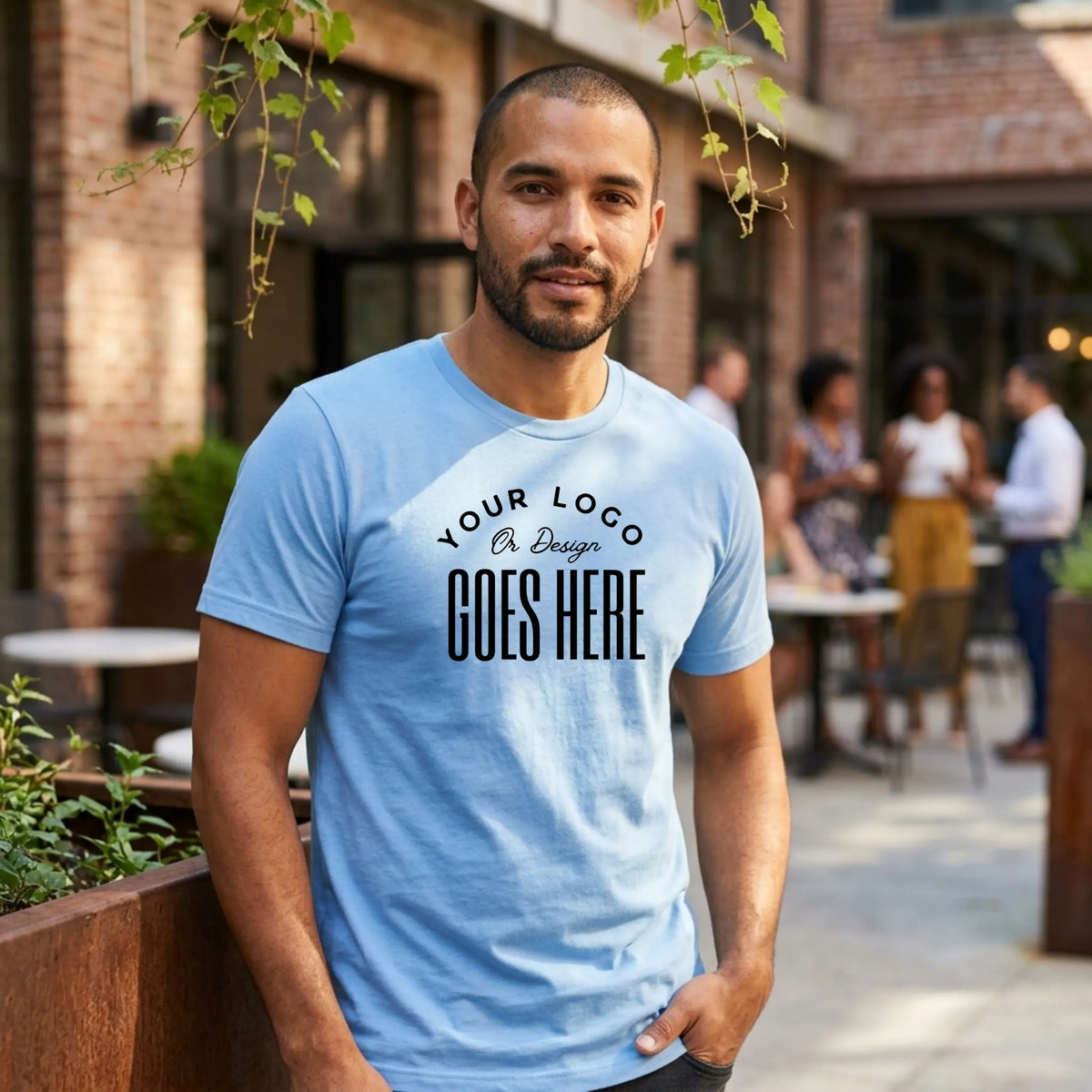 Custom Bella Canvas 3001 unisex jersey T-shirt with Winks Design Studio logo on front, shown on a plain background.