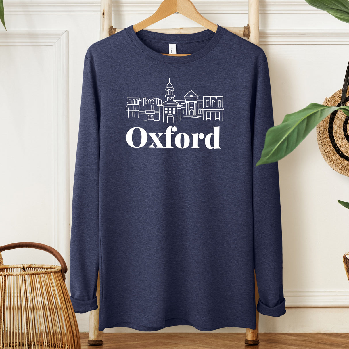 Navy Oxford Skyline Long Sleeve Shirt with White Print Hanging on Wooden Hanger