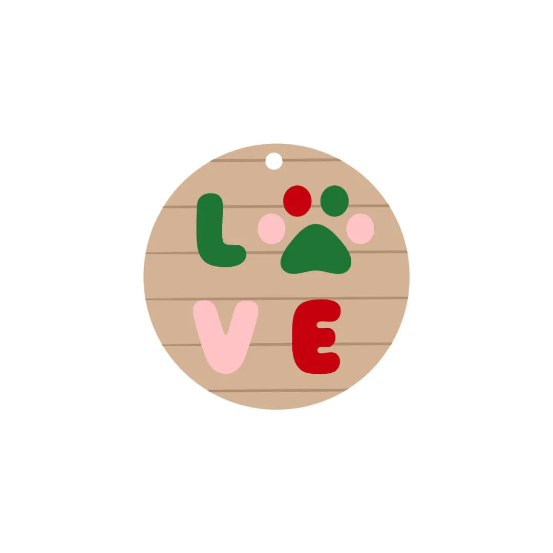 DIY Love Paw Ornament kit by Winks Design Studio, LLC featuring paintable Christmas craft with a paw-shaped ornament and art supplies.