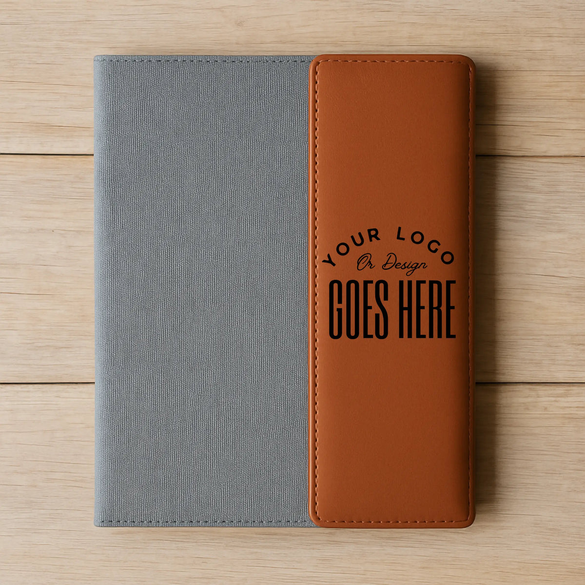 Custom engraved leather portfolio by Winks Design Studio, LLC, featuring a sleek 9.5x12 leather padfolio with personalized engraving.