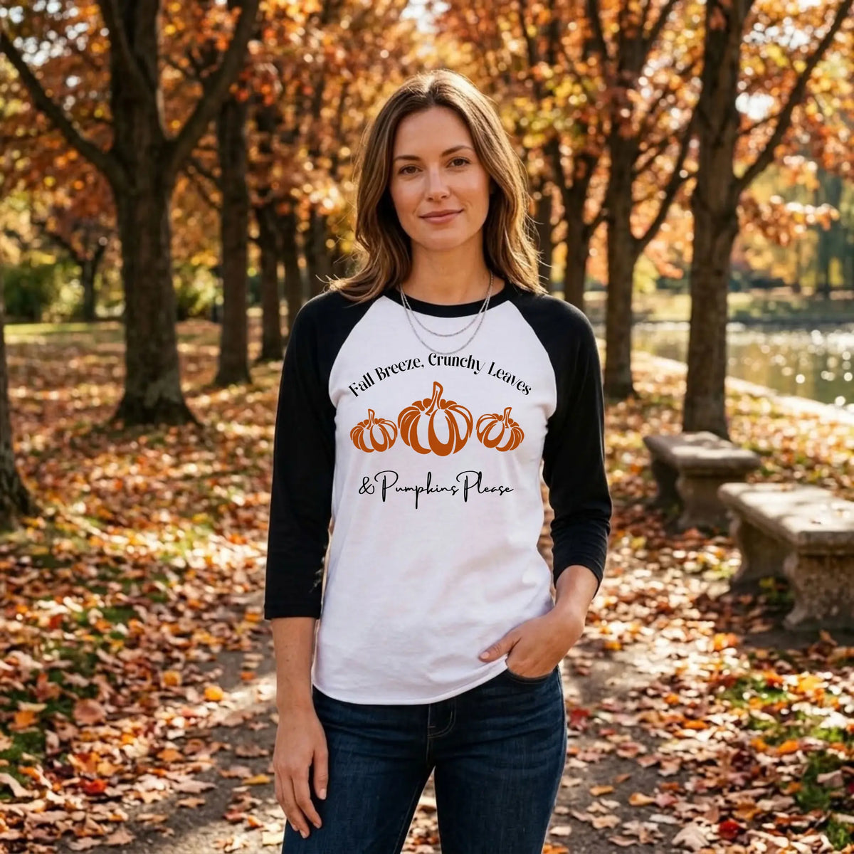 Woman in a white and black "Fall Breeze, Crunchy Leaves &amp; Pumpkins Please" raglan tee in a leafy autumn park