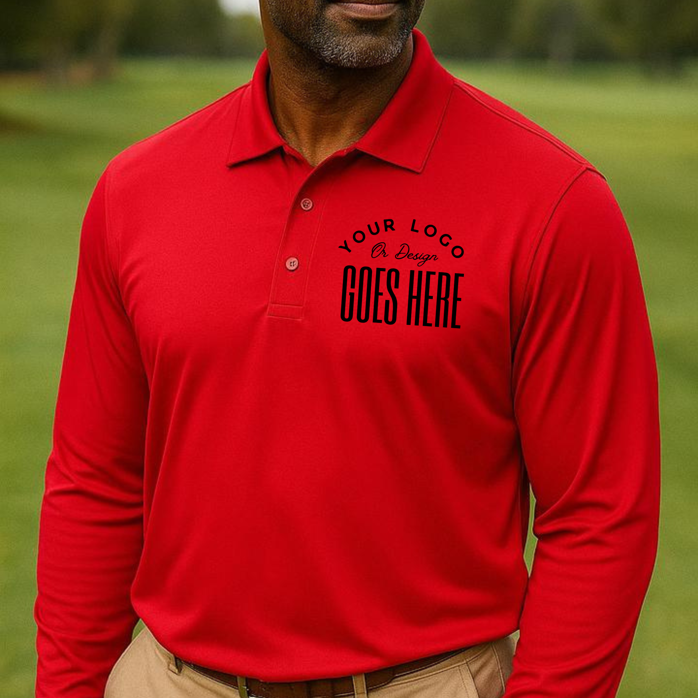 Red polo shirt with customizable text on a blurred green field background