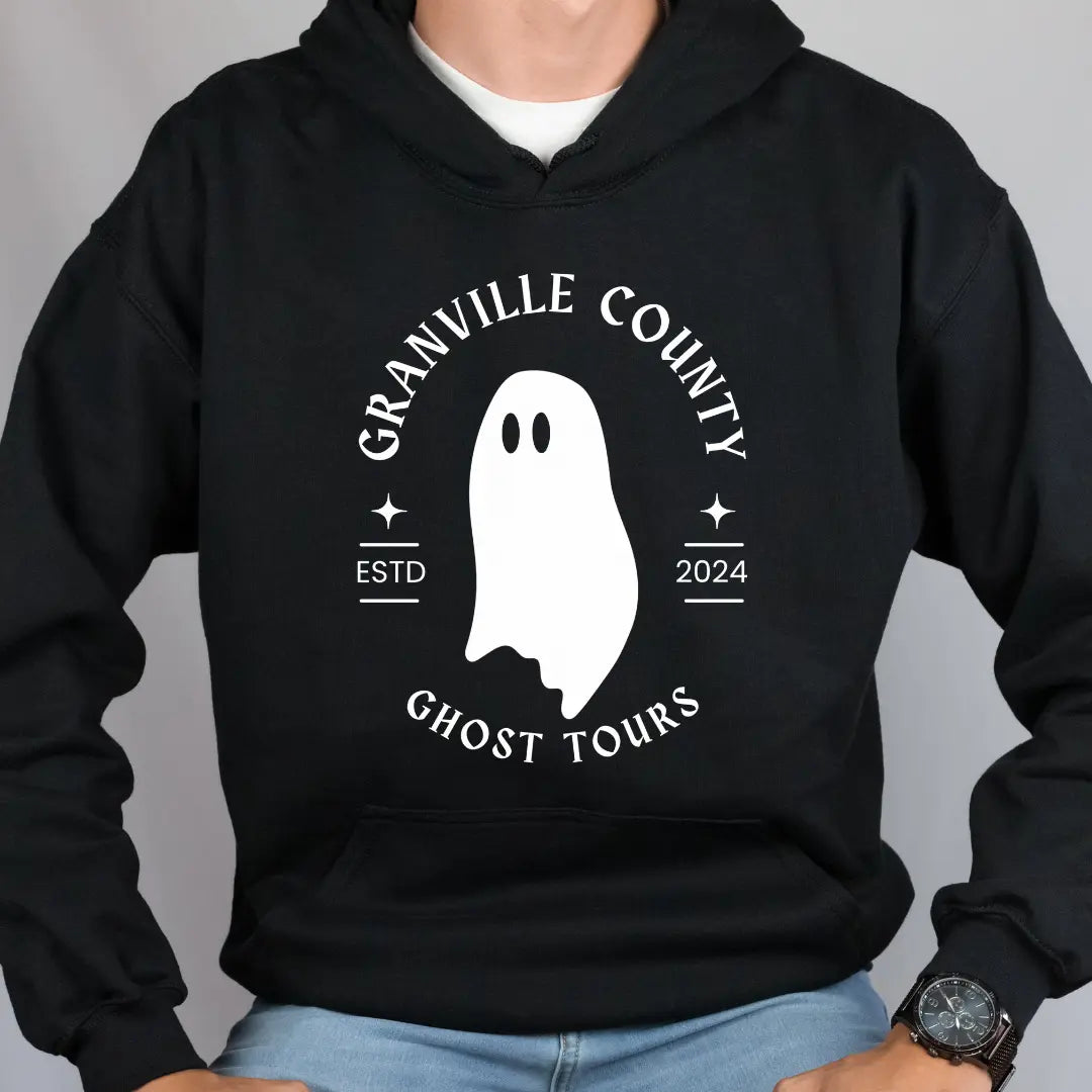 Winks Design Studio LLC Granville County Ghost Tours pocket hoodie with spooky ghost graphic and front pocket, black casual hoodie.