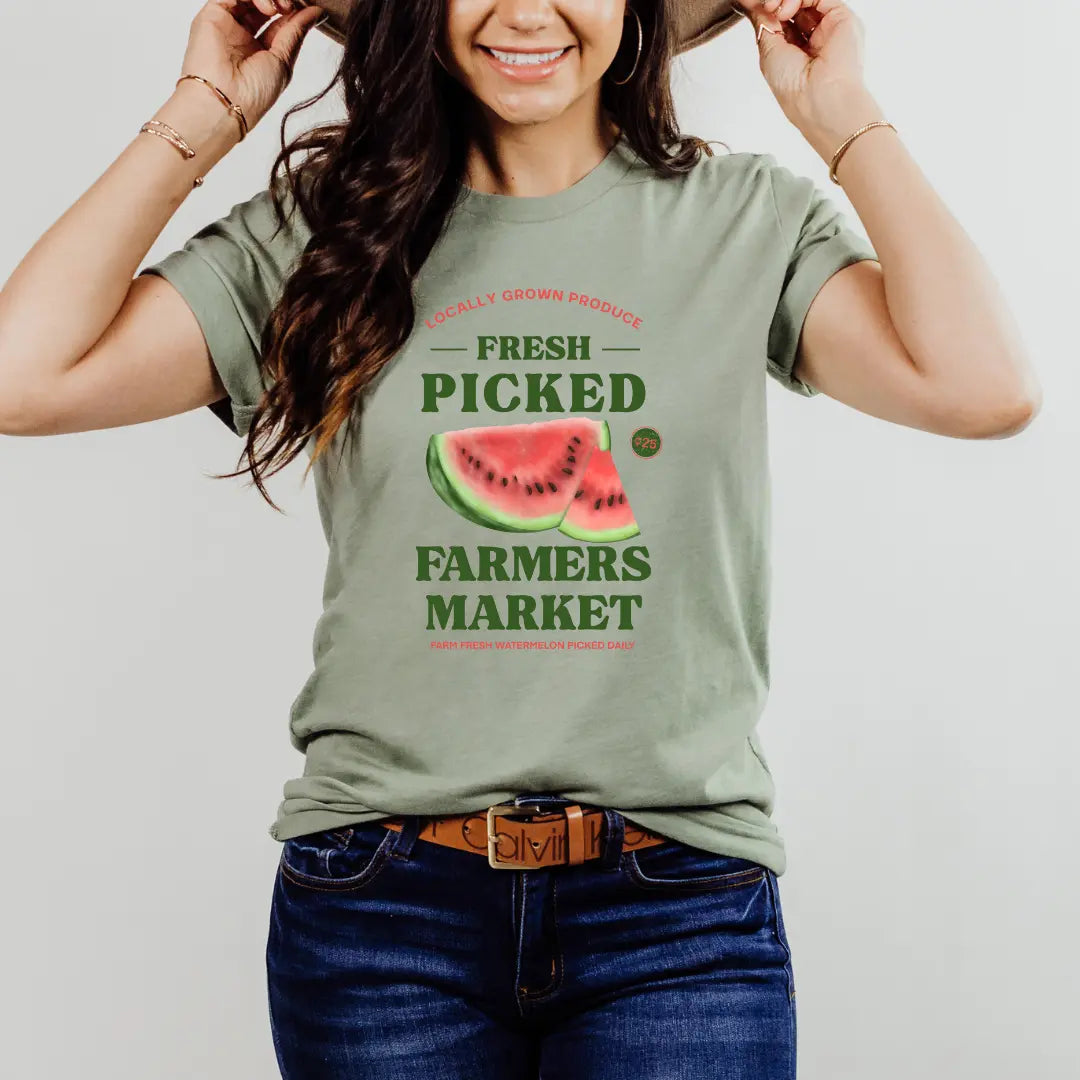 Winks Design Studio LLC farmers market fresh picked watermelon T-shirt featuring a colorful watermelon graphic on soft cotton fabric.