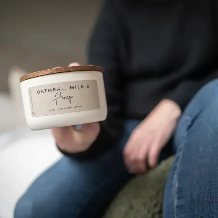 Winks Design Studio Milkhouse Candle Oatmeal, Milk &amp; Honey 10 oz statement candle with creamy oatmeal, honey, and milk scent in a glass jar