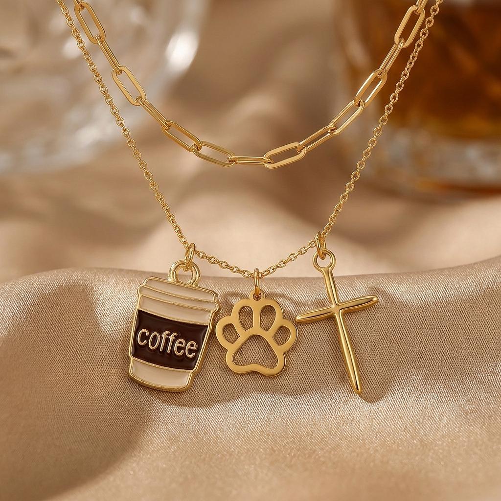18K gold epoxy coffee cup charm by Winks Design Studio, LLC, featuring a detailed miniature coffee cup with gold accents.