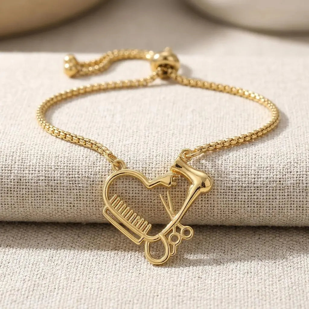 18K gold hair charm jewelry by Winks Design Studio, LLC, featuring intricate design on a delicate charm.