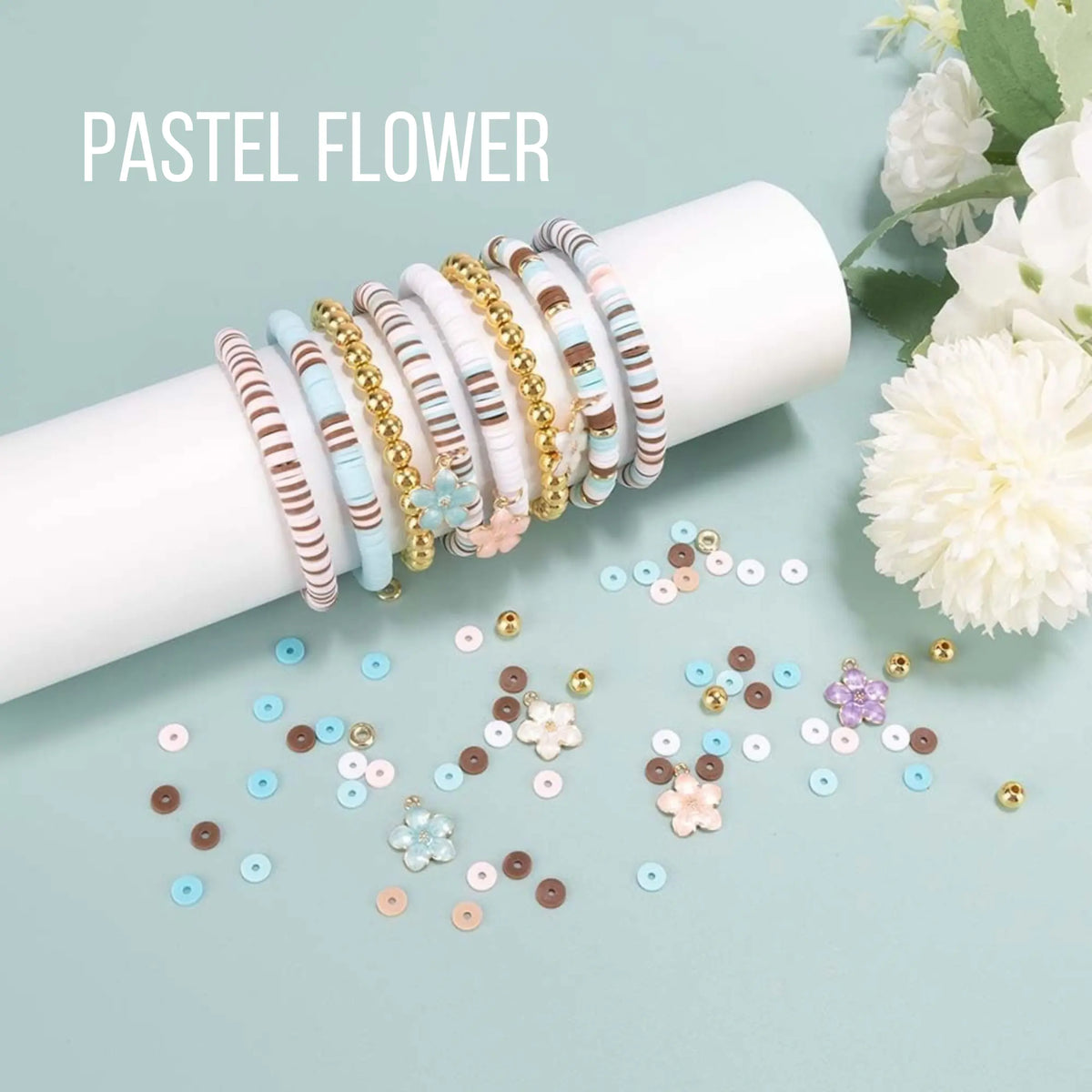 Stacked bracelet workshop kit by Winks Design Studio, LLC with various beads, cords, and tools for jewelry making.