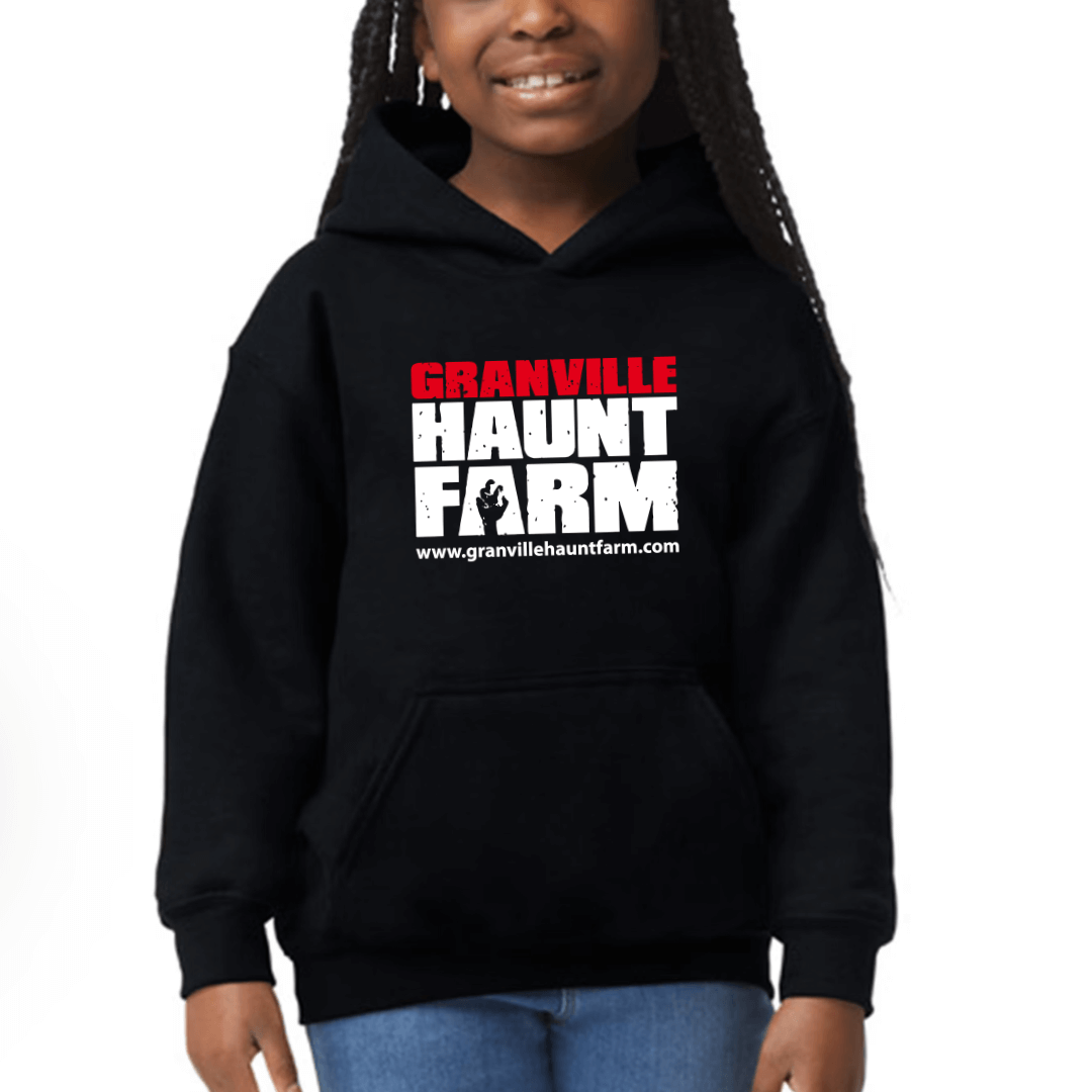 Kid wearing a black Granville Haunt Farm hoodie, showcasing the logo for a fun and spooky style.