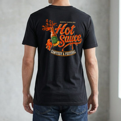 Winks Design Studio NC Hot Sauce Festival bottle T-shirt featuring colorful hot sauce bottle graphic on a casual black tee.