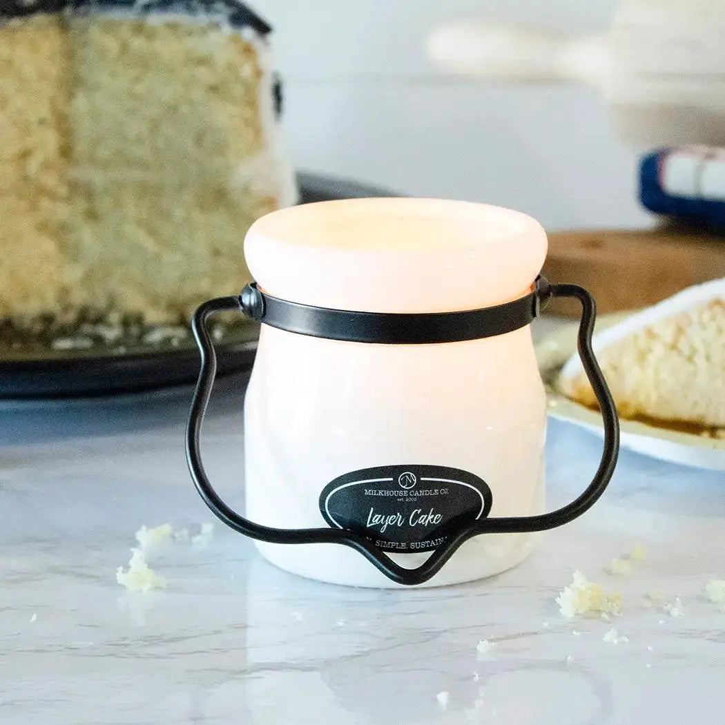 Winks Design Studio Milkhouse Candle 5oz Cream Jar Candle with Layer Cake scent, showing the cream-colored jar and wick.