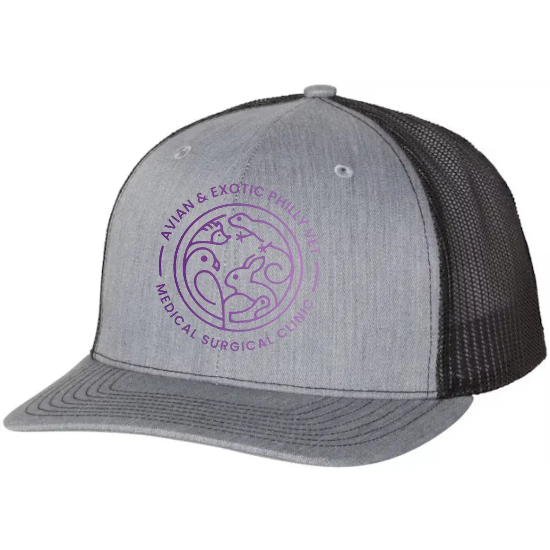 Colorful Avian Exotic Trucker Hat by Winks Design Studio, LLC featuring bird-themed embroidery on breathable mesh cap.