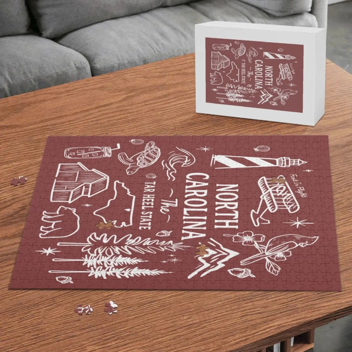 North Carolina "Tar Heel State" wooden puzzle by Winks Design Studio, LLC with 500 pieces, featuring a detailed map design.