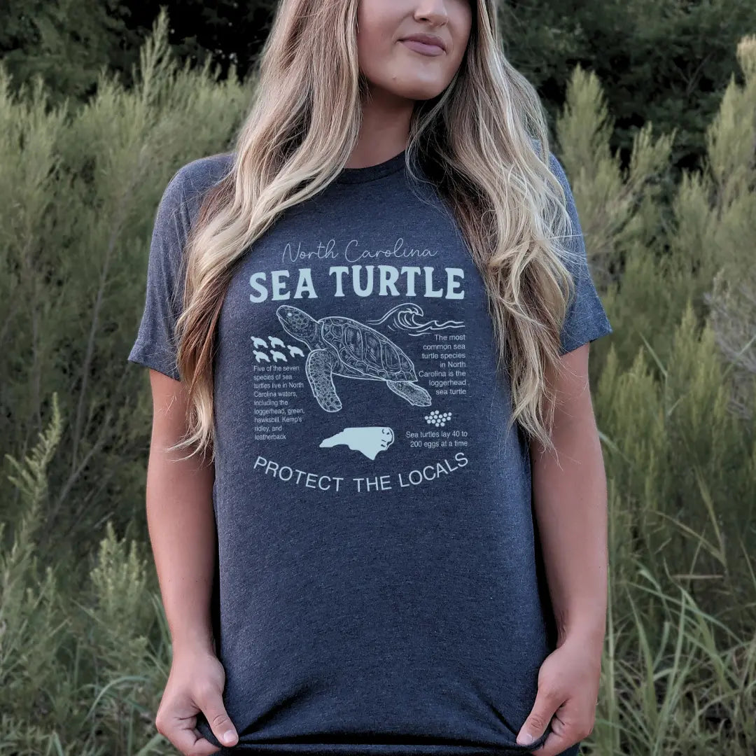 North Carolina Coastal Sea Turtle T-shirt by Winks Design Studio, LLC featuring a sea turtle graphic on a casual cotton tee.
