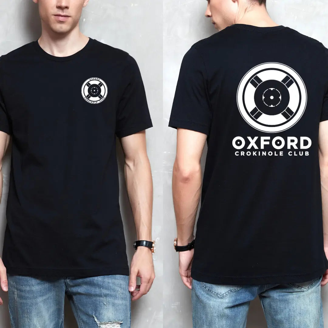 Winks Design Studio Oxford Crokinole Club short sleeve T-shirt, navy blue with Crokinole game graphic on front.