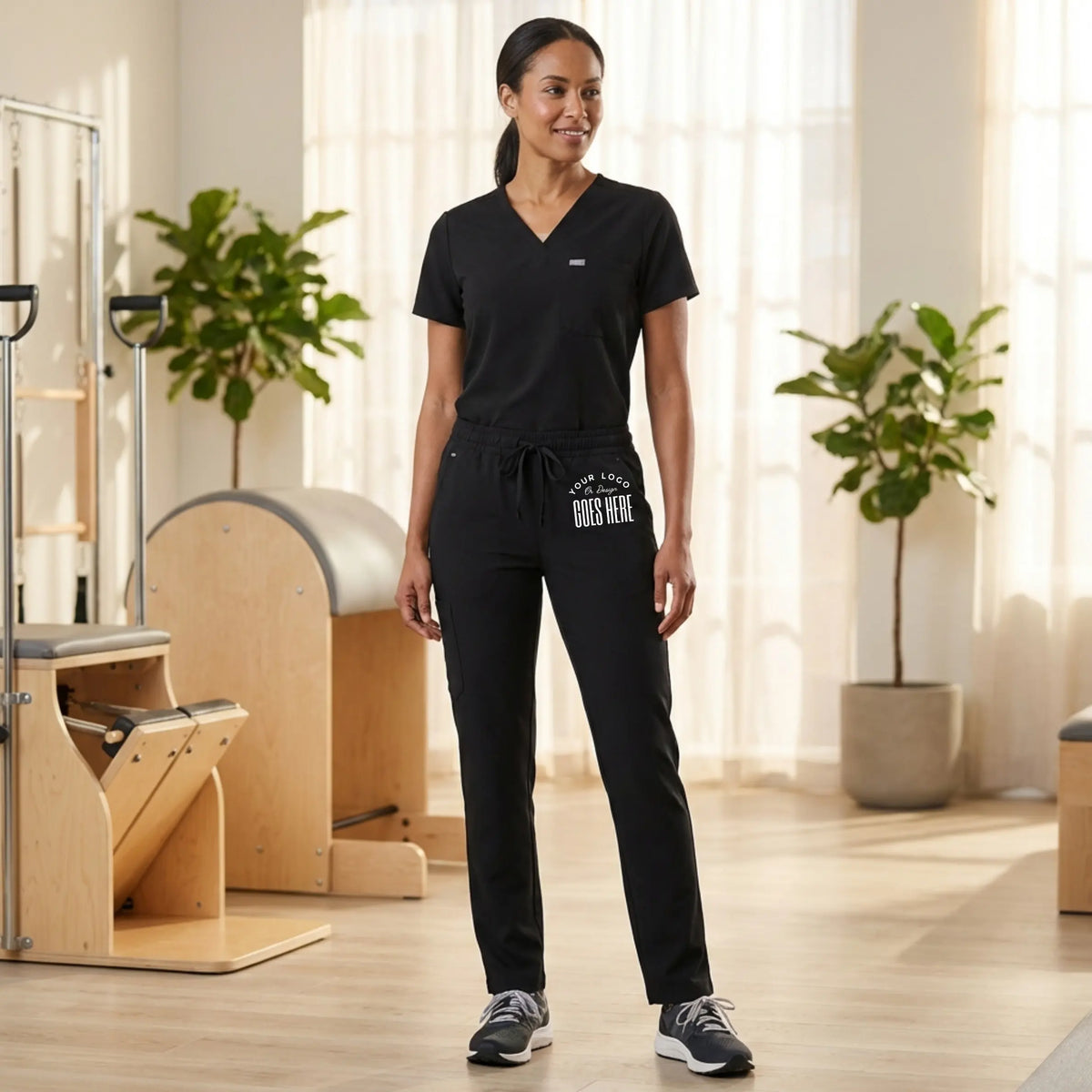 Custom Jaanuu unisex Rhodes straight-leg scrub pants in navy, featuring a comfortable fit and functional pockets.
