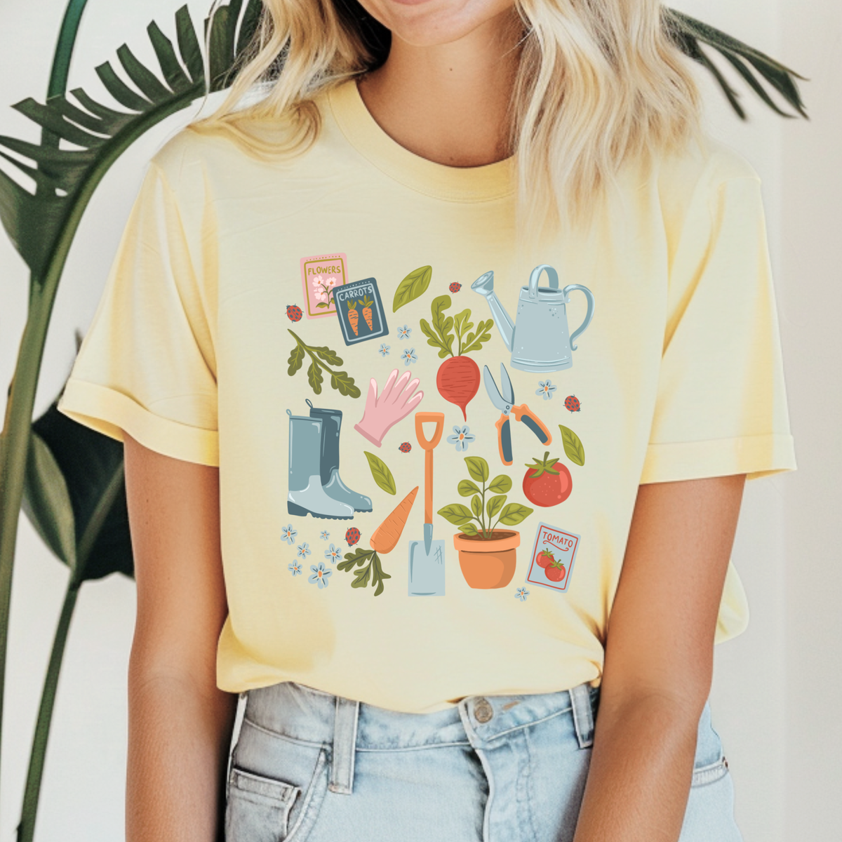 Winks Design Studio Garden Essentials Tee, casual green shirt with garden-themed design, made from soft cotton fabric.