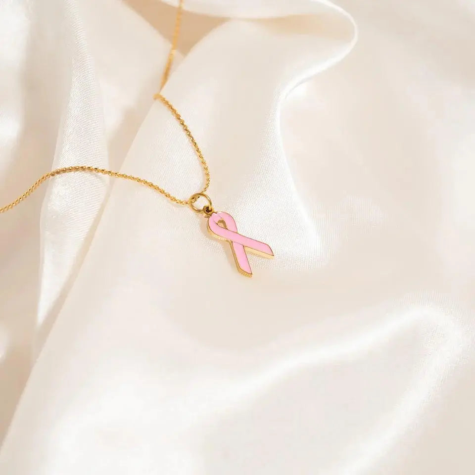 18K gold pink cancer ribbon charm from Winks Design Studio, LLC, featuring a delicate cancer awareness symbol.