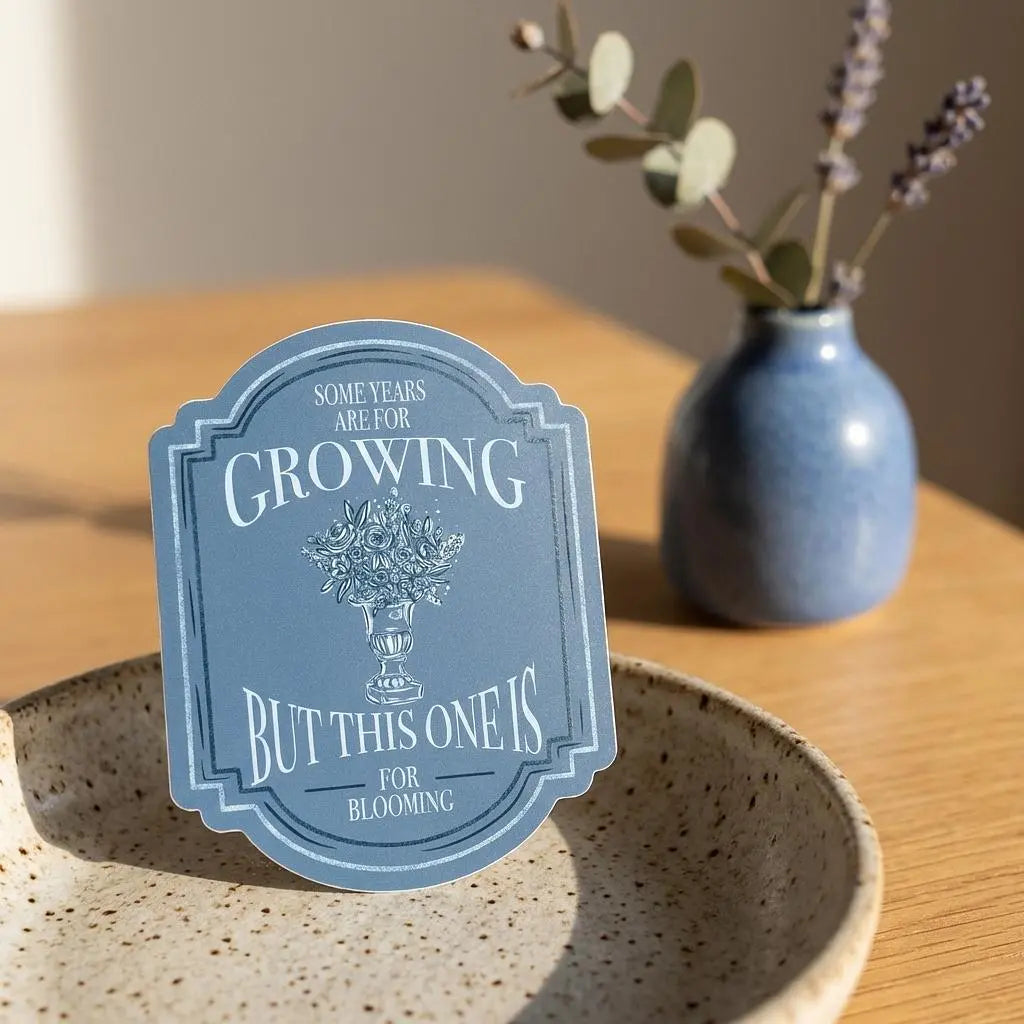 Colorful "Some Years Are for Growing" sticker by Winks Design Studio, LLC, featuring vibrant lettering on a smooth surface.