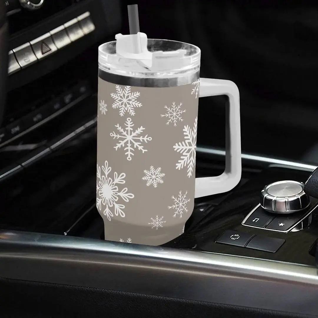 Winks Design Studio stainless steel water bottle with snowflake design, 40oz capacity, durable tumbler for cold or hot drinks.
