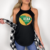 Woman wearing SCBA Halter Tank top in black, showcasing South Carolina Beekeepers Association logo, paired with blue jeans and plaid shirt.