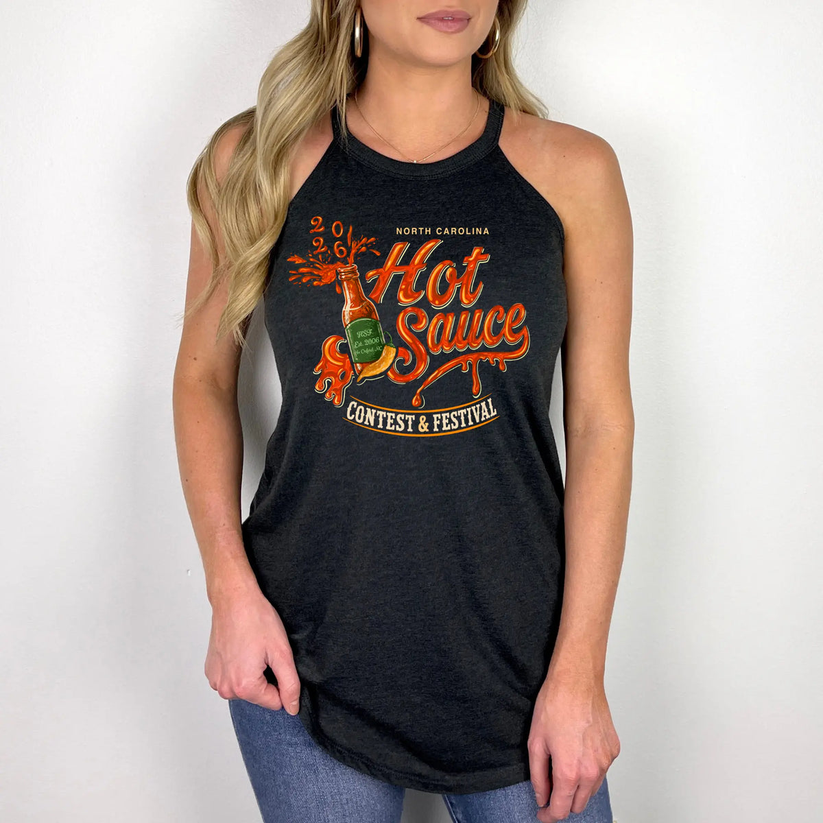 Winks Design Studio NC Hot Sauce Festival halter tank top featuring vibrant colors and a fun festival design on soft fabric.