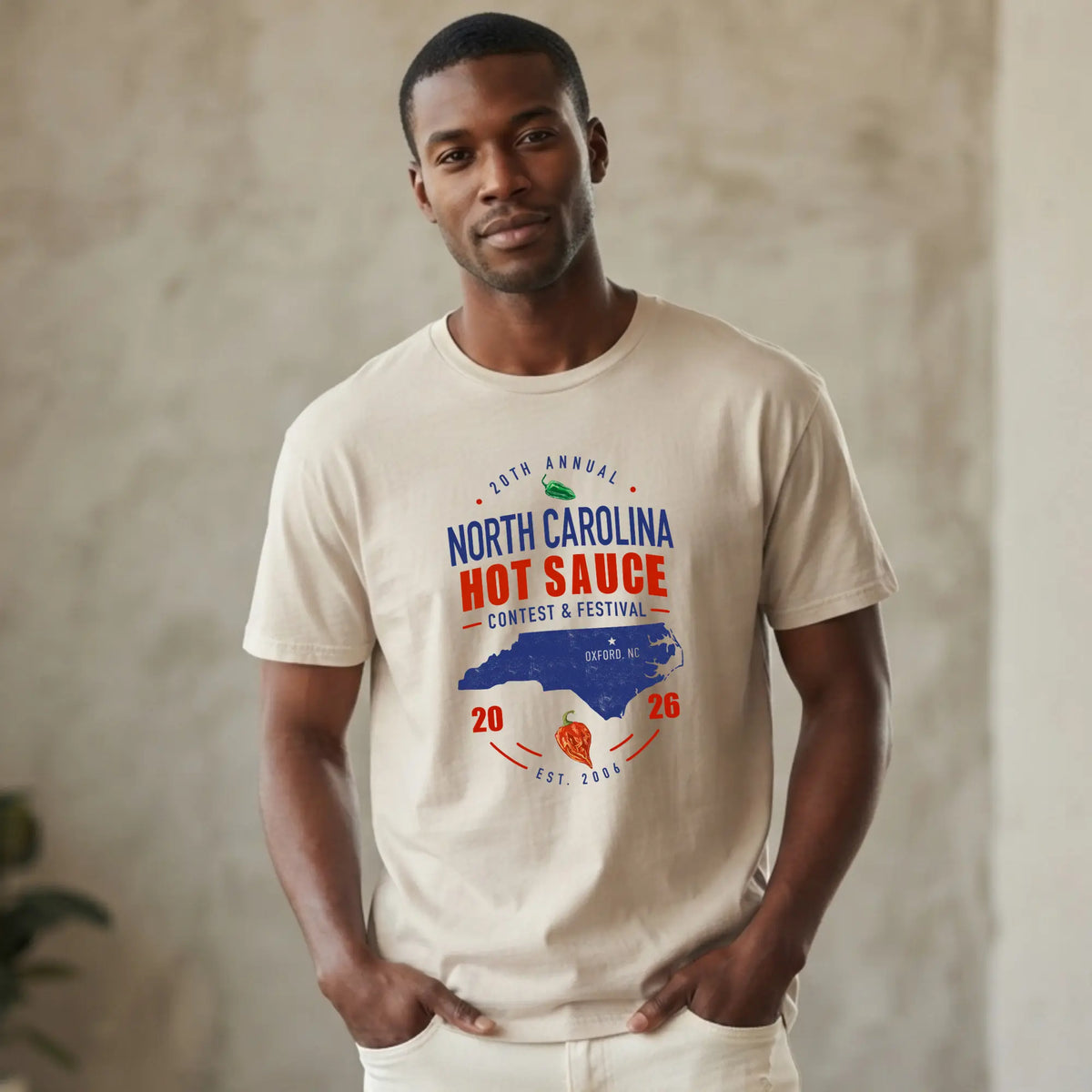 Winks Design Studio Carolina Classic T-shirt featuring colorful hot sauce festival graphic on a casual cotton tee.