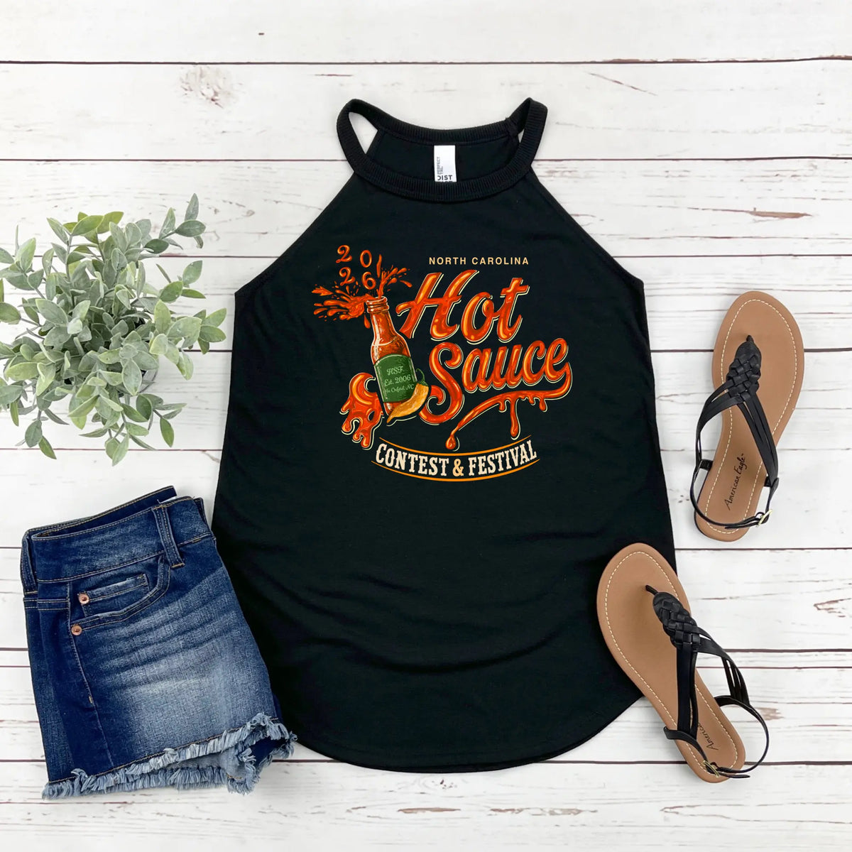 Winks Design Studio NC Hot Sauce Festival halter top in vibrant fabric, featuring a stylish neck tie and sleeveless design.