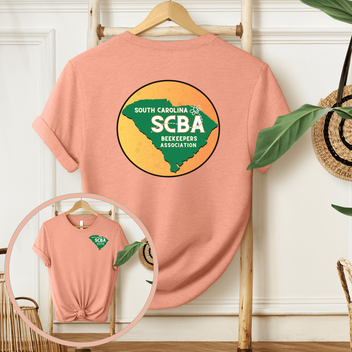 SCBA Short Sleeve T-Shirt with South Carolina Beekeeper Association logo on a hanger, back and front view