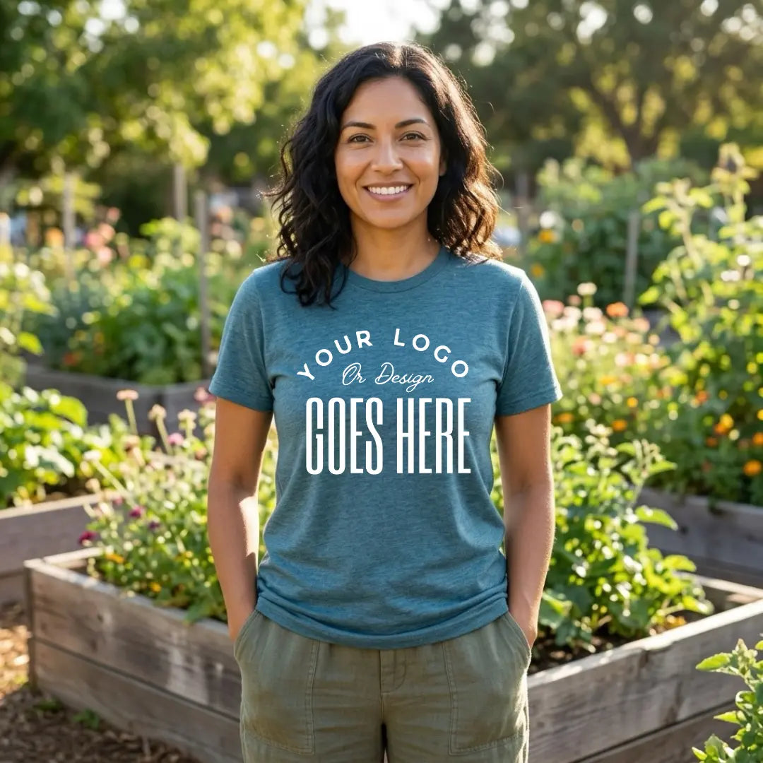 Heather deep teal custom t-shirt with a large white "Your Logo or Design Goes Here" center chest placeholder print