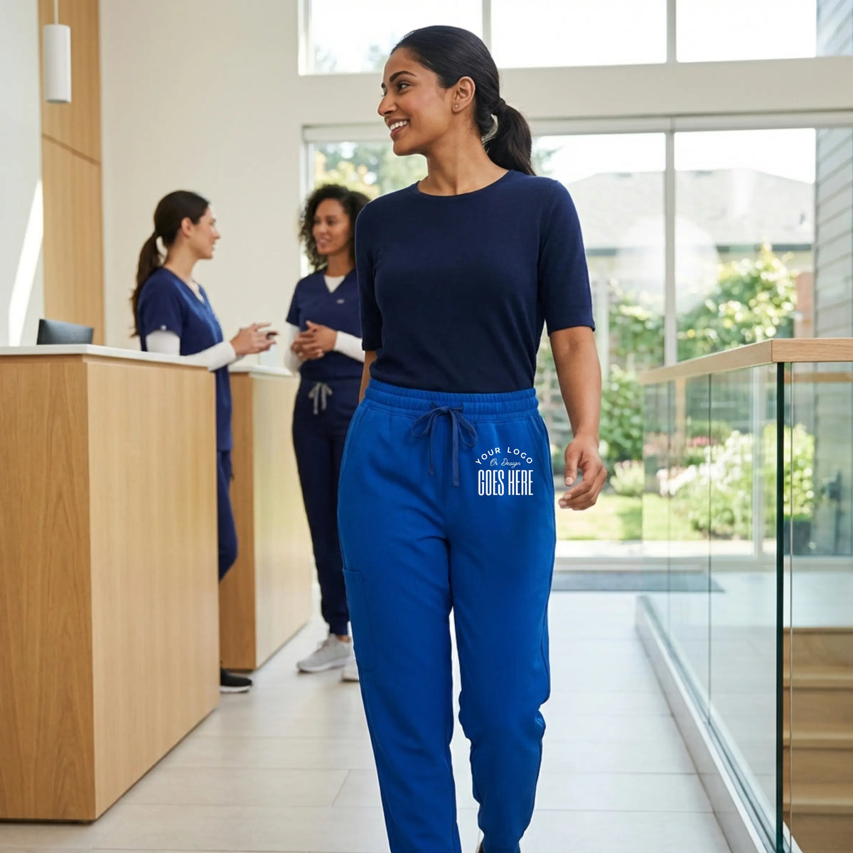 Unisex custom medical scrub joggers by Jaanuu Osmo with 8 pockets, casual and professional medical apparel from Winks Design Studio.