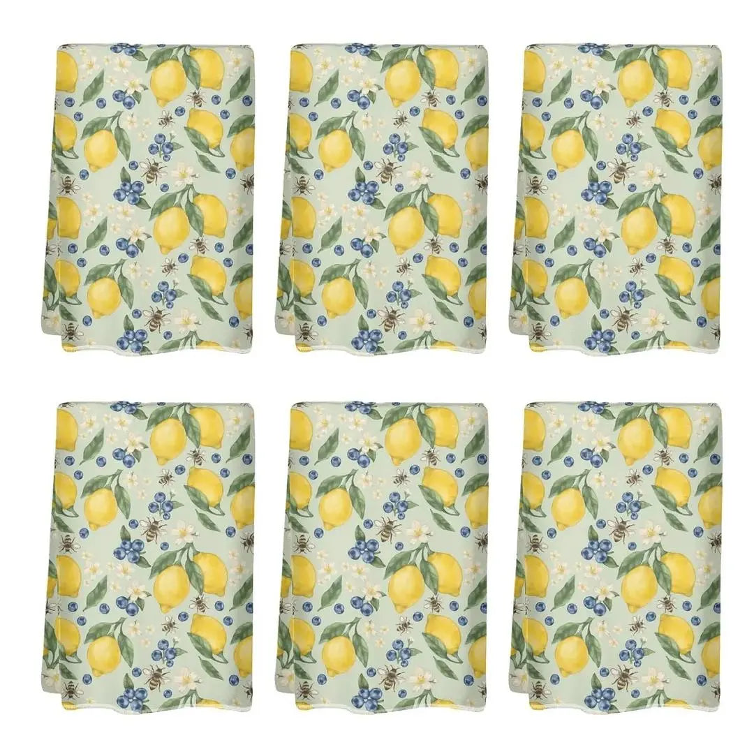 Lemonberry Bloom kitchen towel by Winks Design Studio, LLC featuring a vibrant lemon and berry floral pattern.