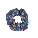 Harvest Pumpkin Scrunchie with festive autumn design and soft cotton material for a comfortable, gentle hold, perfect for fall accessories.