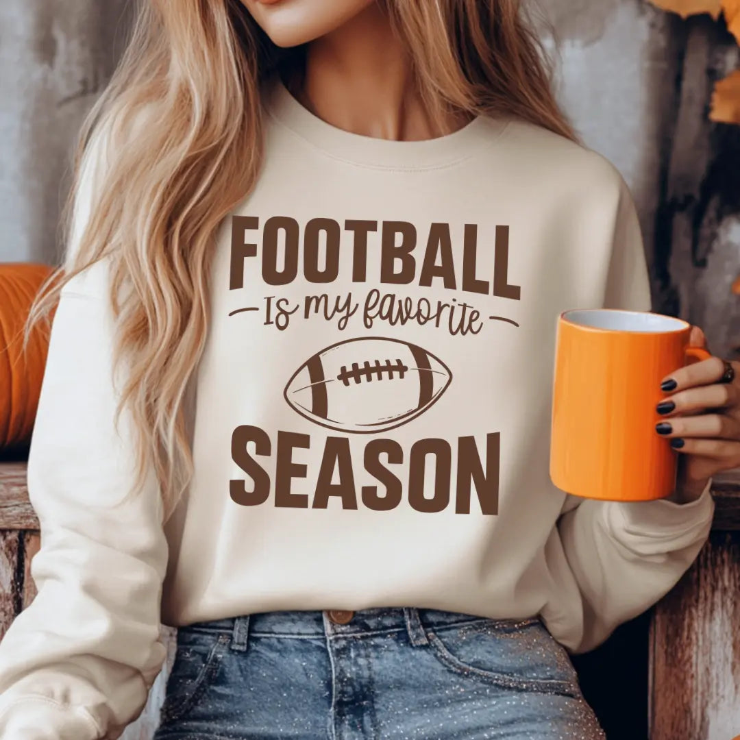 Football is My Favorite Season crewneck by Winks Design Studio, LLC, featuring a casual knit fabric with a football-themed graphic.