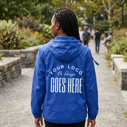 Back view of a royal blue custom hooded windbreaker with a large white "Your Logo or Design Goes Here" full back placeholder print
