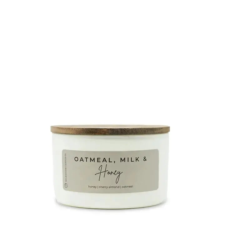 Winks Design Studio Milkhouse Candle in oatmeal, milk, and honey scent, 10 oz statement candle with soy wax and natural fibers.