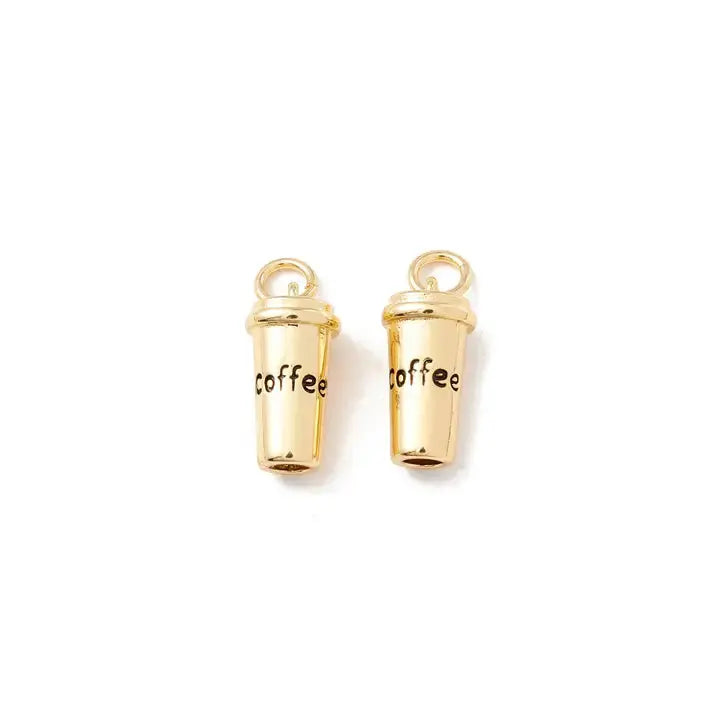 Gold coffee charm from Winks Design Studio, LLC featuring a detailed coffee cup and saucer charm for jewelry or crafts.