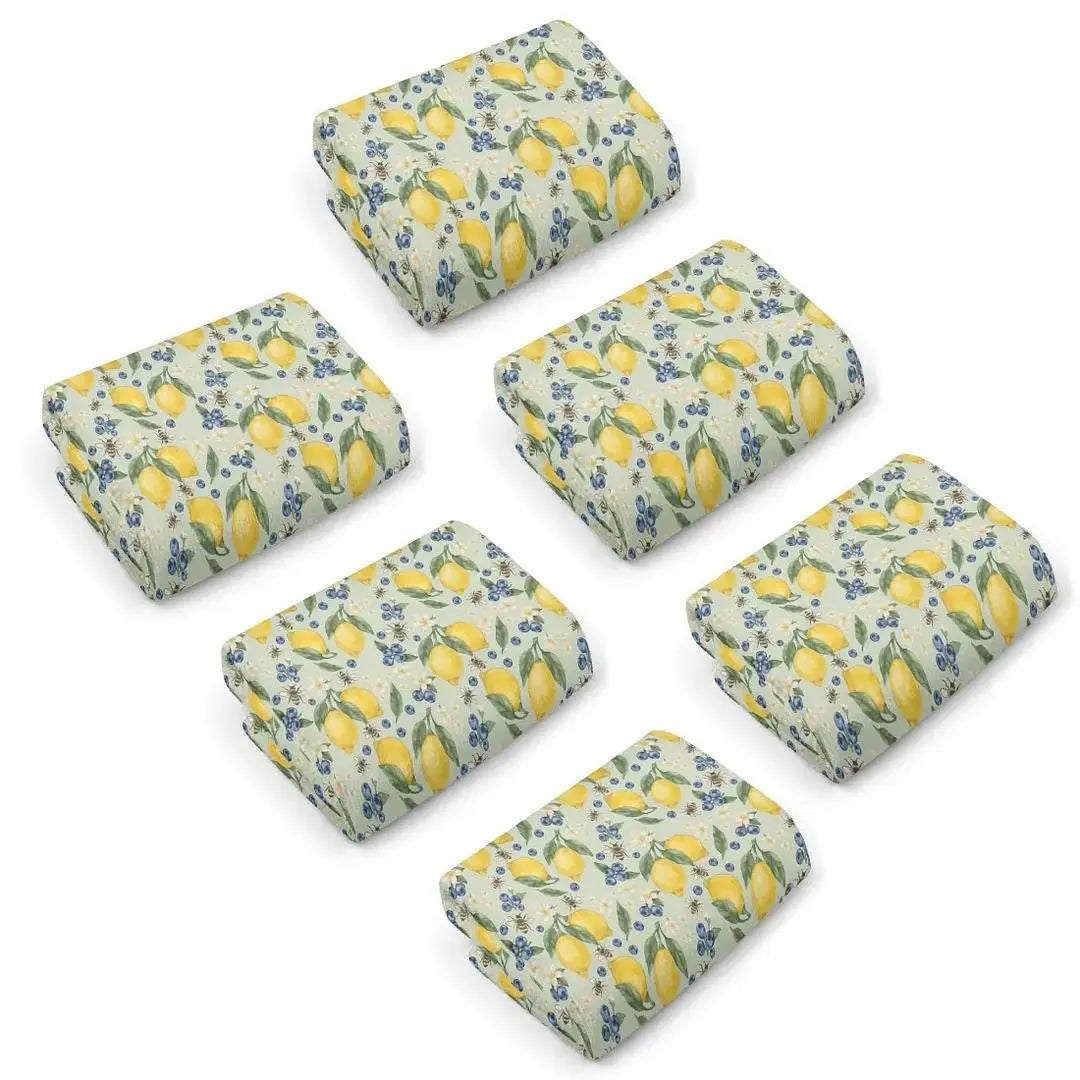 Lemonberry Bloom kitchen towel by Winks Design Studio, LLC featuring a vibrant floral pattern and soft fabric texture.