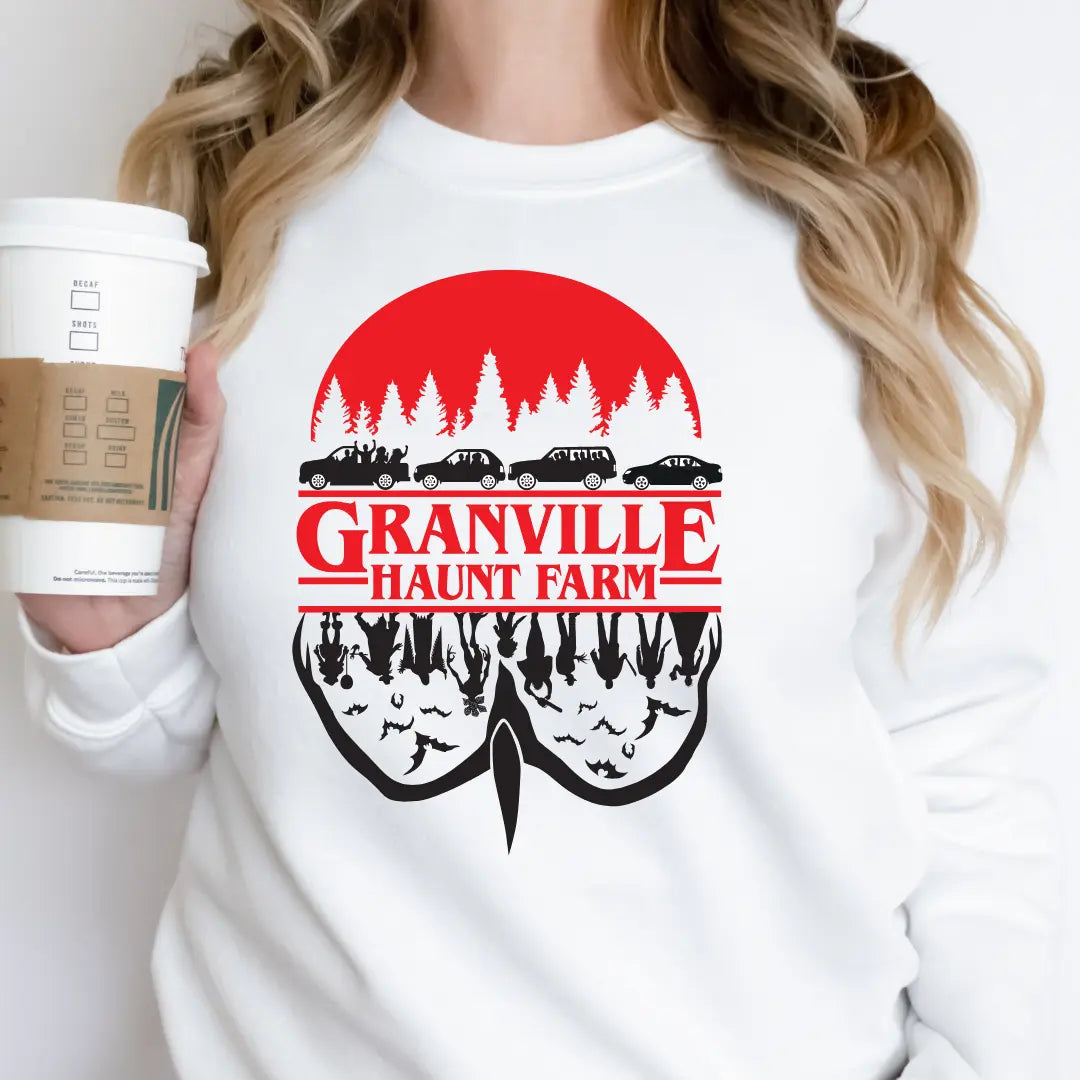 Winks Design Studio LLC Granville Haunt Farm upside-down long sleeve shirt with spooky Halloween farm graphic on black fabric.