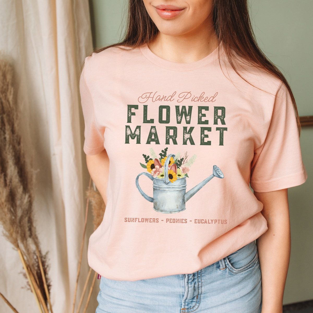 Winks Design Studio Flower Market graphic tee featuring colorful flower illustrations on a casual cotton shirt.