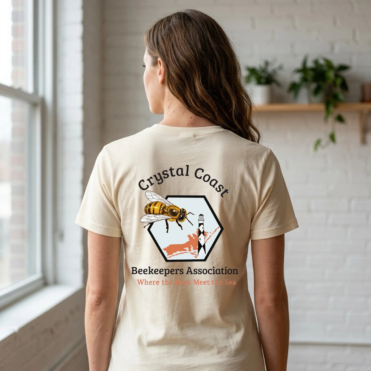 Crystal Coast Beekeepers T-shirt by Winks Design Studio, LLC featuring bees and honeycomb graphic on a casual cotton T-shirt.