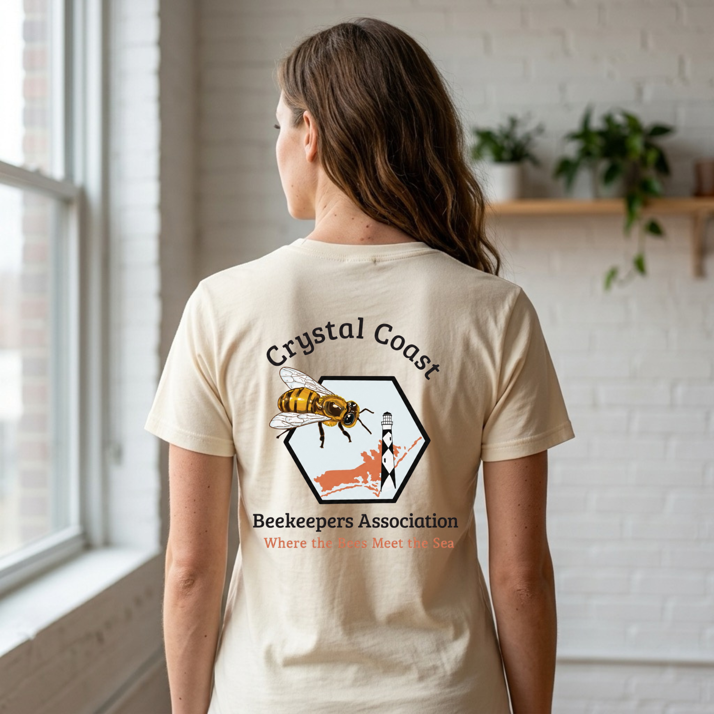 Crystal Coast Beekeepers T-shirt by Winks Design Studio, LLC featuring bees and honeycomb graphic on a casual cotton T-shirt.
