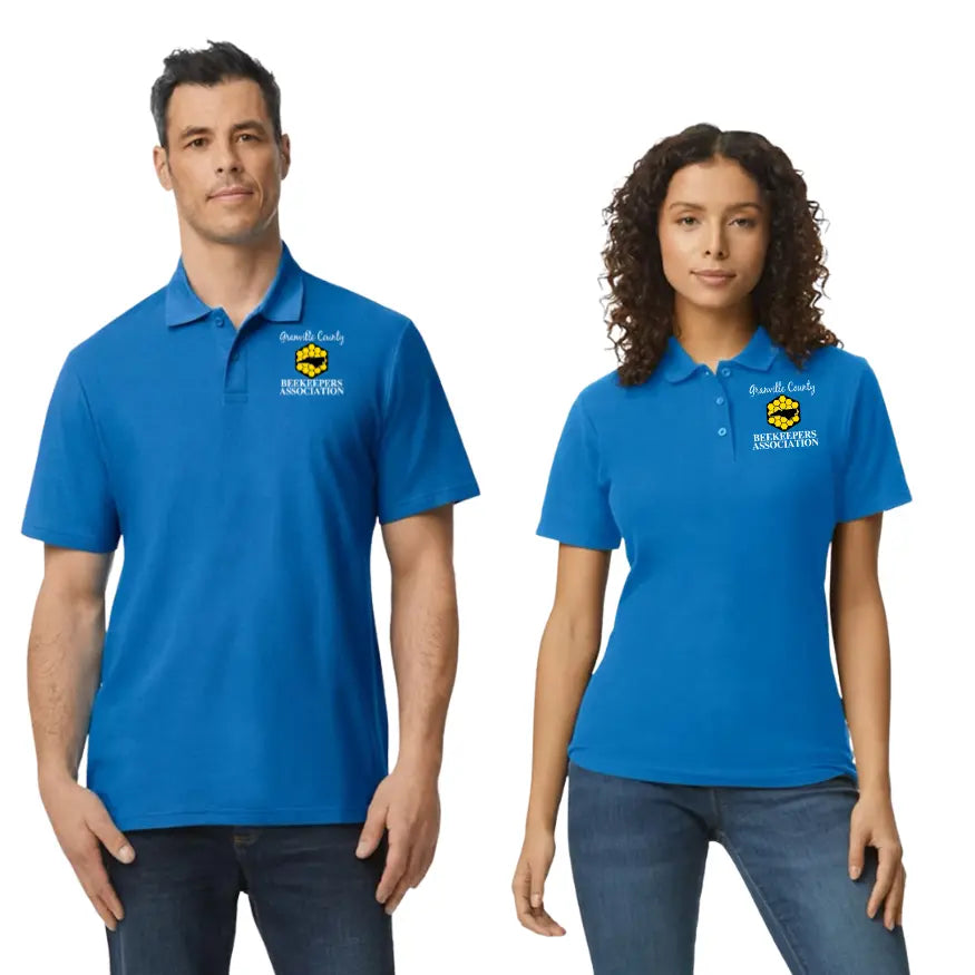Gildan polo shirt featuring the GCBA team logo, designed by Winks Design Studio, LLC, displayed on a clean background.