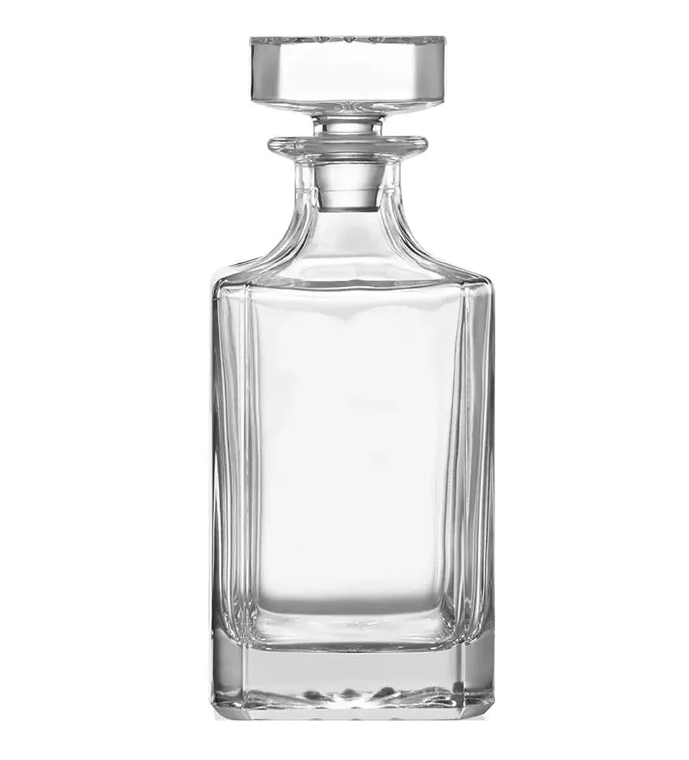 Custom engraved glass decanter from Winks Design Studio, LLC, featuring a clear, elegant design with intricate engraving details.