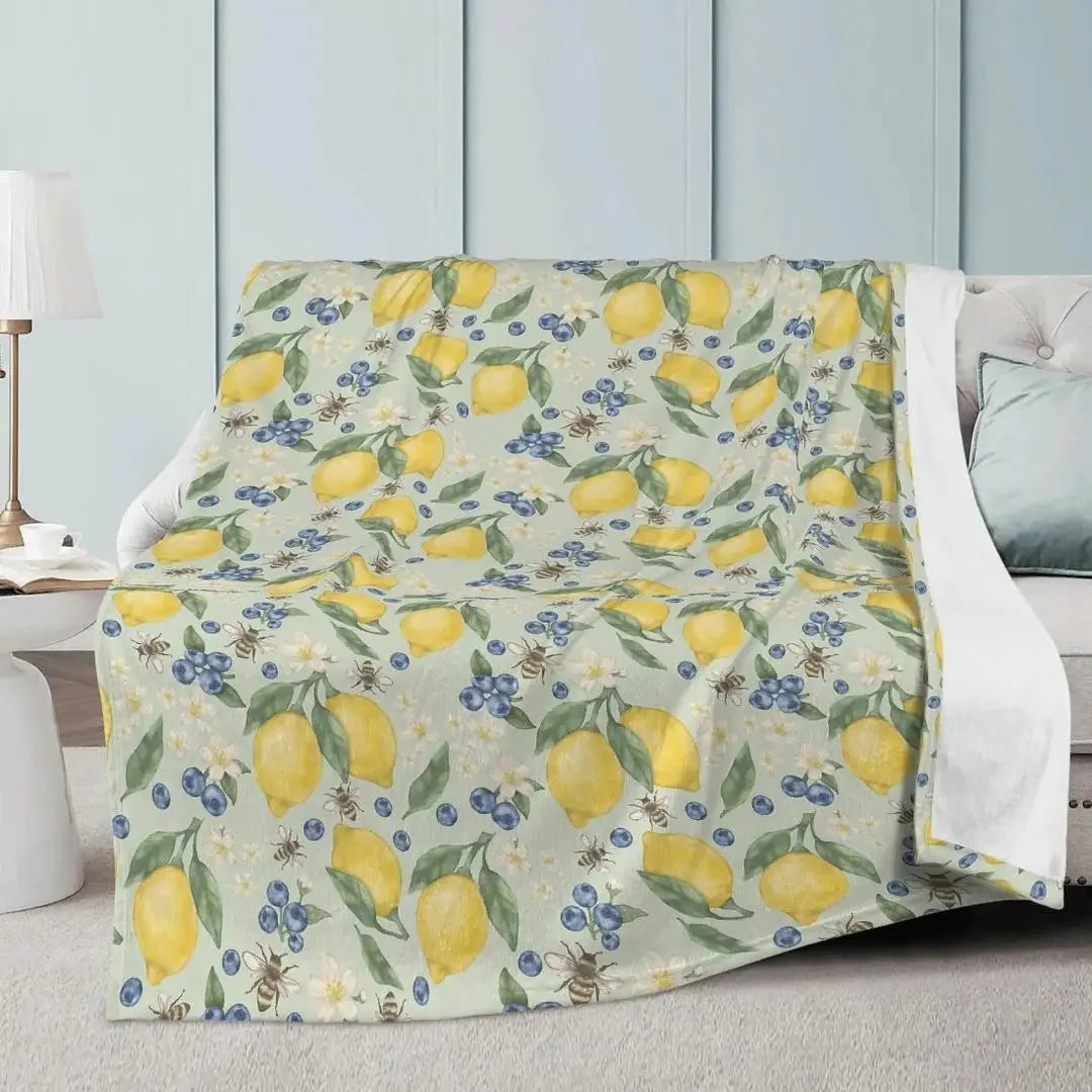 Lemonberry Bloom fleece blanket by Winks Design Studio, LLC, featuring a cozy floral pattern in 80x60 inches.