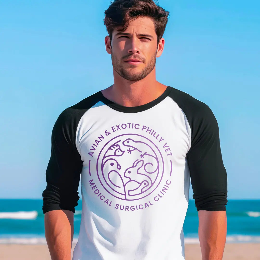 Winks Design Studio, LLC Avian Exotic Raglan Baseball T-Shirt featuring a colorful bird illustration on casual black and white fabric
